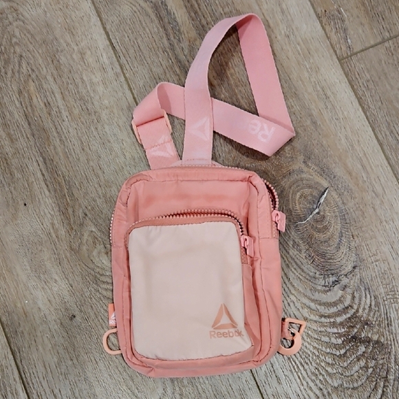 Reebok Handbags - Reebok Coral and Peach Crossbody Bag